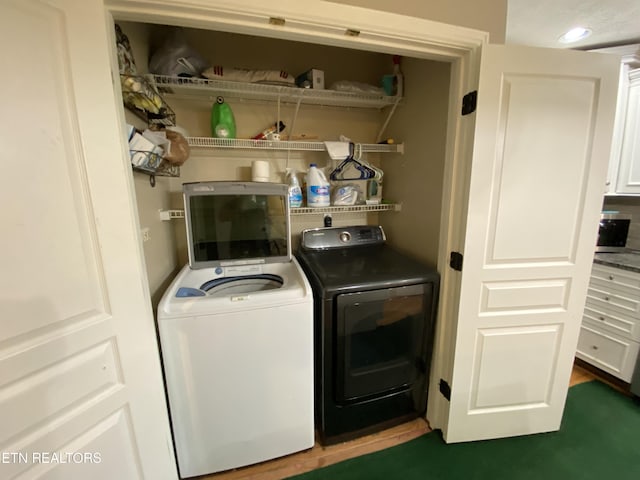 laundry area with washer and clothes dryer