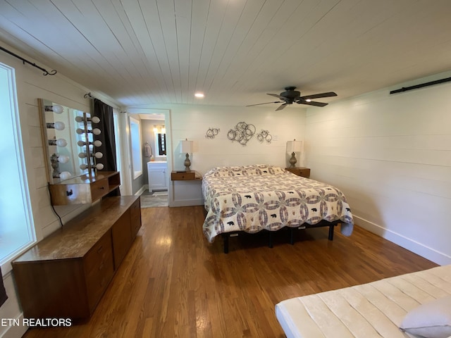 bedroom with wood ceiling, wood-type flooring, and ceiling fan