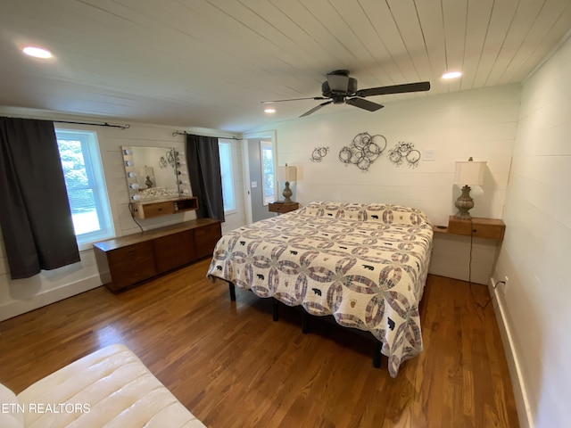 bedroom with hardwood / wood-style flooring, ceiling fan, and wooden ceiling