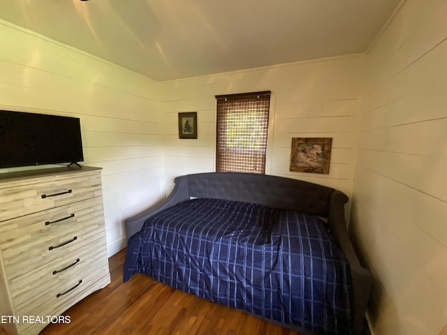 bedroom featuring dark wood-type flooring