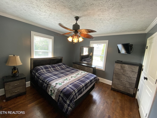 bedroom with crown molding, a textured ceiling, dark hardwood / wood-style floors, and ceiling fan