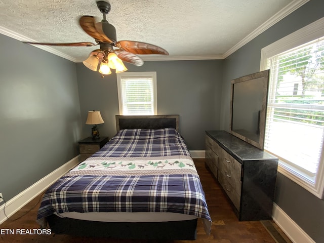 bedroom featuring crown molding, dark hardwood / wood-style floors, ceiling fan, and a textured ceiling