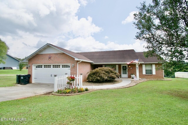 ranch-style house with a garage and a front lawn