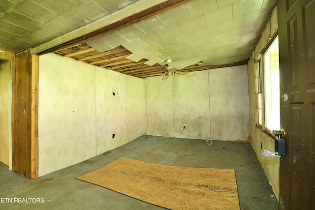 basement with ceiling fan