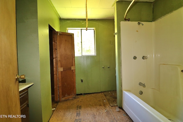 full bathroom with vanity and washtub / shower combination