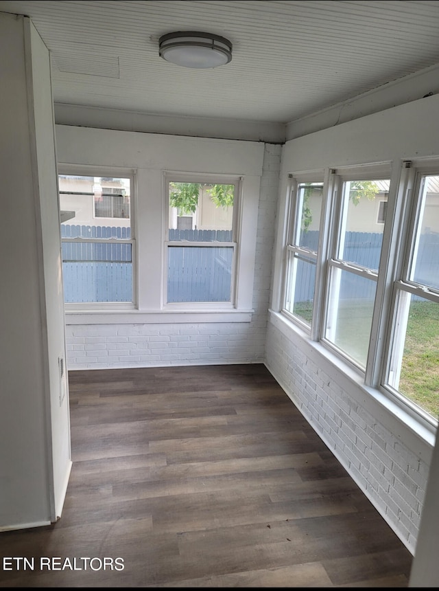 unfurnished sunroom with a healthy amount of sunlight