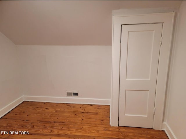 227 Gill St, Alcoa, TN 37701 - additional living space featuring wood finished floors, baseboards, and vaulted ceiling