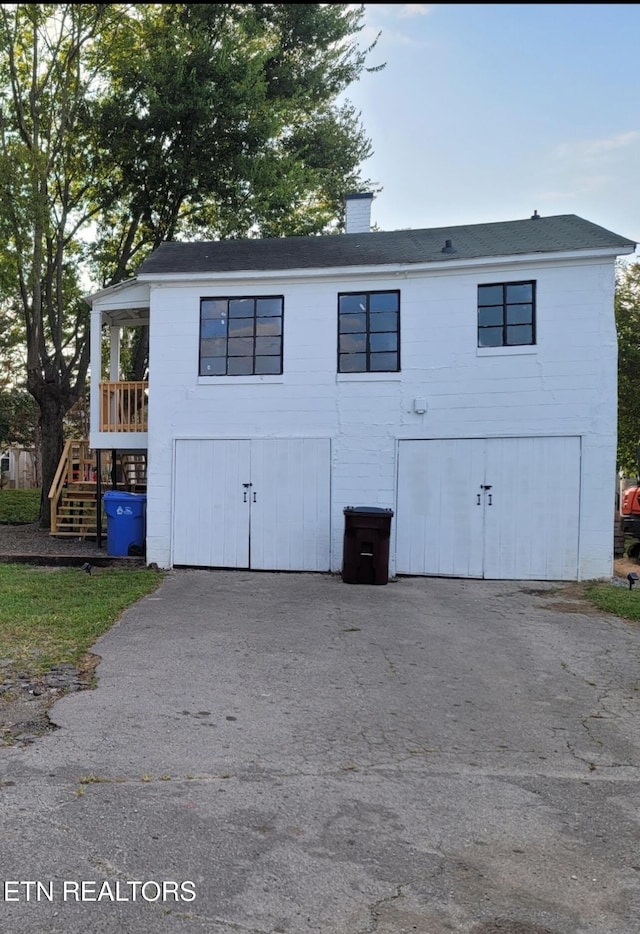 227 Gill St, Alcoa, TN 37701 - back of property featuring stairway and a chimney
