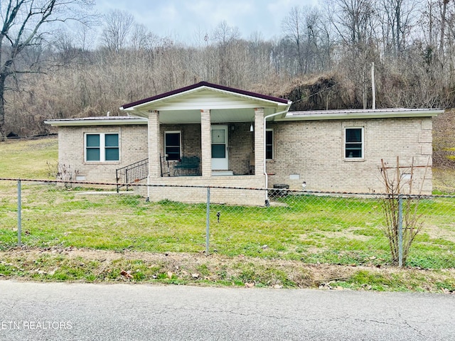 view of front of home with a porch and a front lawn