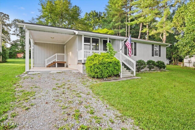 view of front of home with a front yard