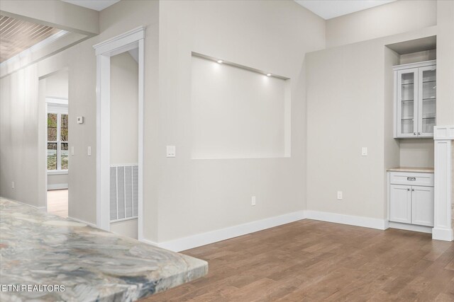 dining space featuring hardwood / wood-style flooring