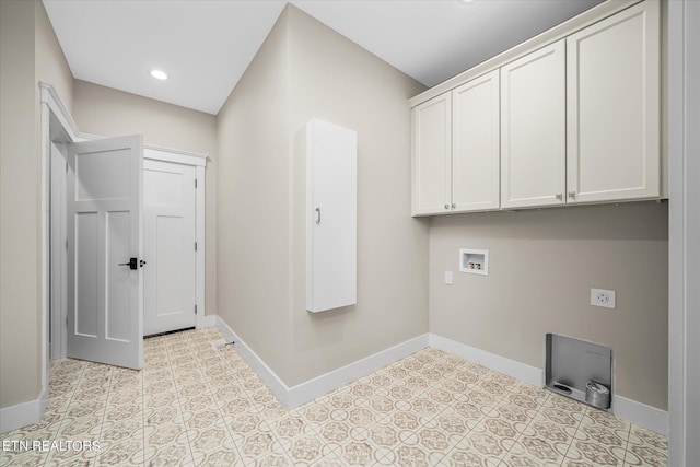 washroom with cabinets, hookup for a washing machine, light tile patterned floors, and hookup for an electric dryer