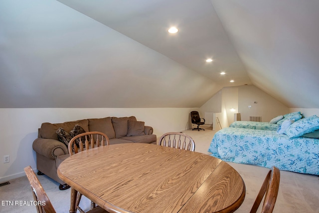 interior space featuring vaulted ceiling