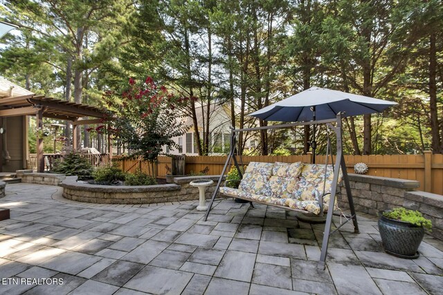 view of patio / terrace featuring a pergola