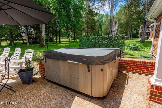 view of patio featuring a hot tub