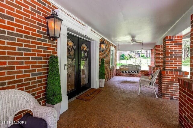 view of patio with ceiling fan