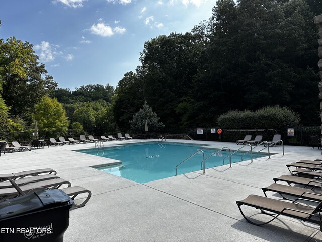 view of pool with a patio area