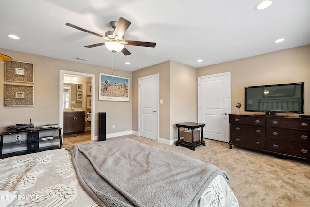 bedroom featuring recessed lighting, light colored carpet, and baseboards