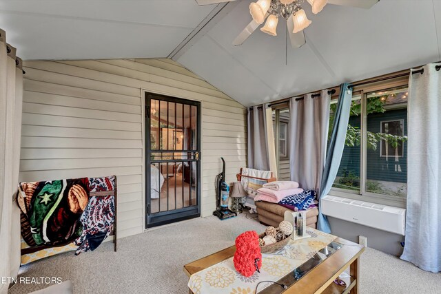 sunroom featuring vaulted ceiling and ceiling fan