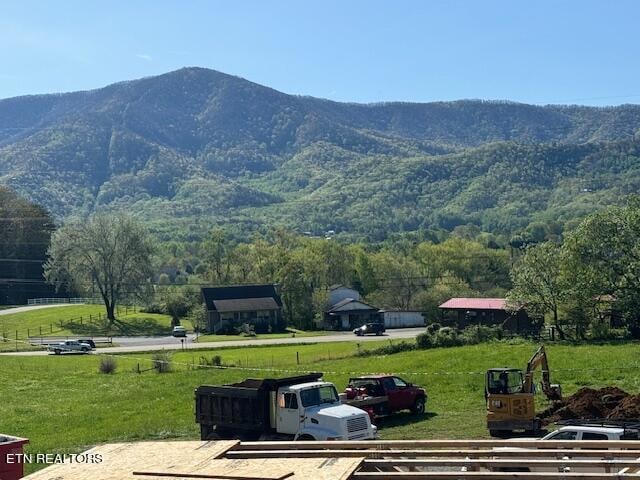 property view of mountains featuring a rural view