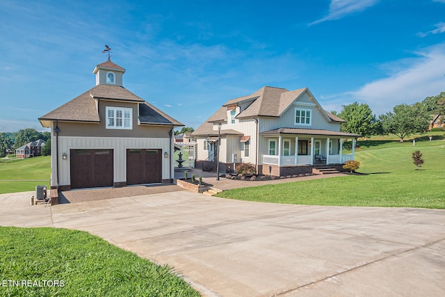 view of front of home with roof with shingles, a porch, board and batten siding, and a front yard