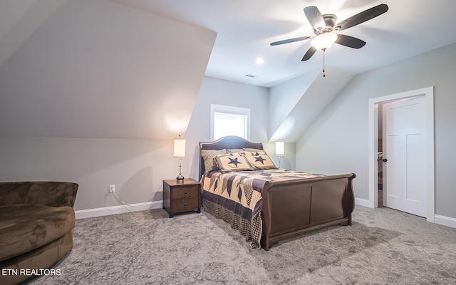 bedroom with lofted ceiling, carpet, a ceiling fan, and baseboards