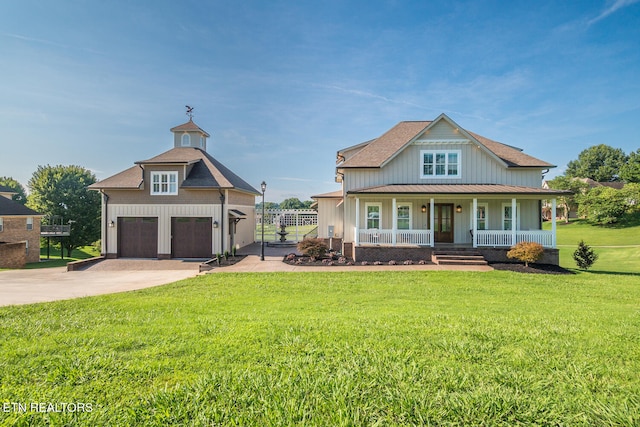 view of front of house featuring a front lawn, board and batten siding, and a porch