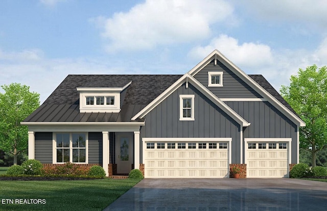 modern farmhouse with concrete driveway, brick siding, a standing seam roof, and roof with shingles