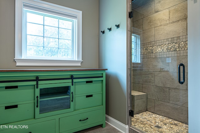 bathroom featuring an enclosed shower