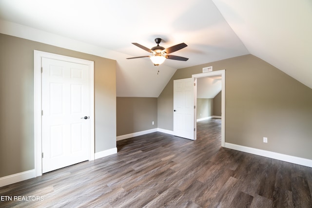 bonus room with lofted ceiling, hardwood / wood-style floors, and ceiling fan