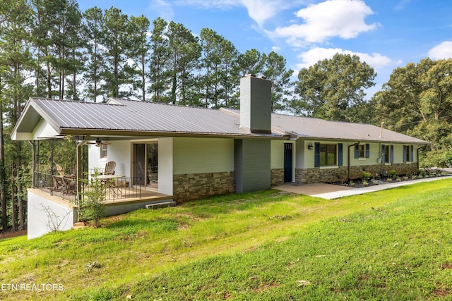 ranch-style house with a front yard