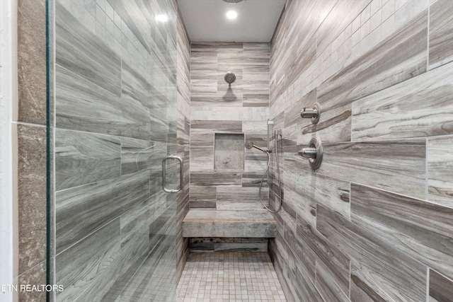 bathroom with an enclosed shower