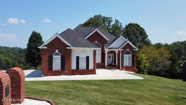 view of front of home with a front lawn