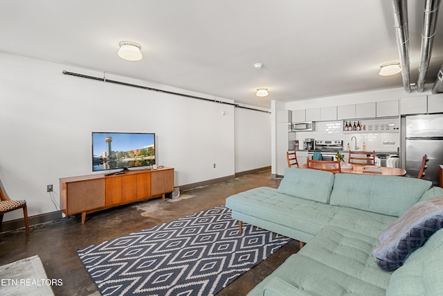 living room featuring sink