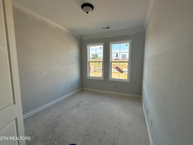 spare room with ornamental molding