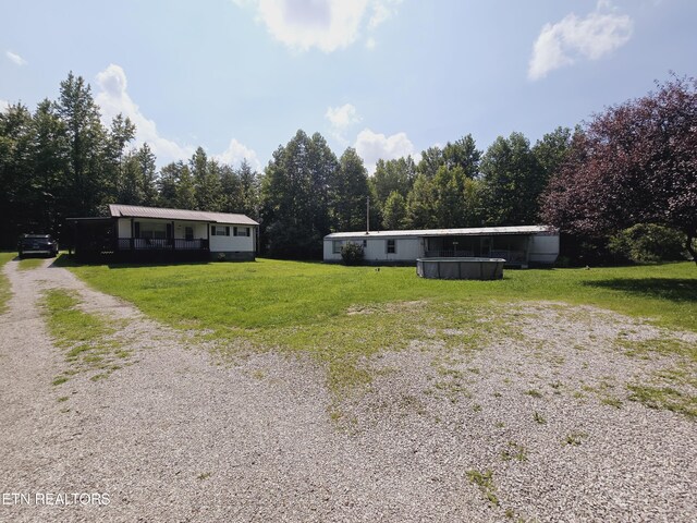 view of front of home with a front lawn