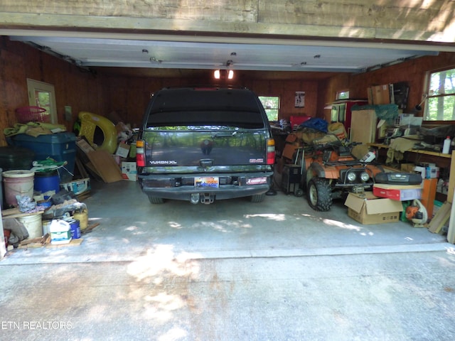 garage with wood walls