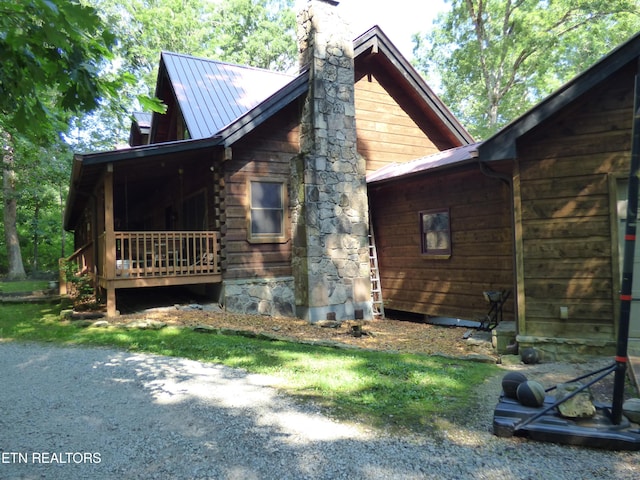 view of home's exterior featuring a porch