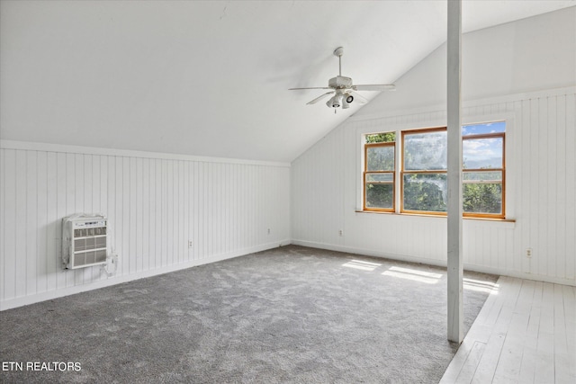 bonus room with ceiling fan, lofted ceiling, carpet floors, and heating unit