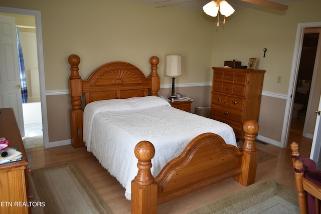 bedroom featuring light hardwood / wood-style flooring and ceiling fan