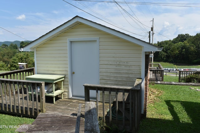 view of outdoor structure featuring a yard