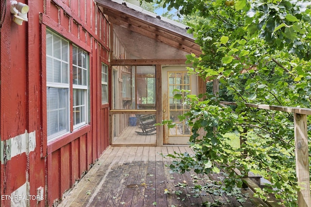 doorway to property featuring a deck