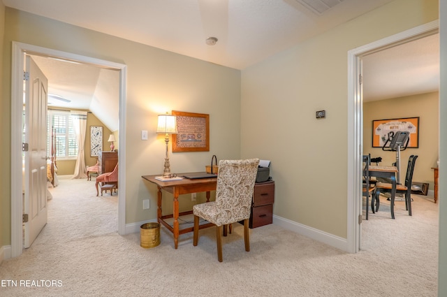 office featuring carpet floors, baseboards, and visible vents