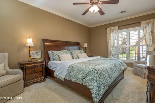 bedroom with crown molding, visible vents, a ceiling fan, light carpet, and baseboards