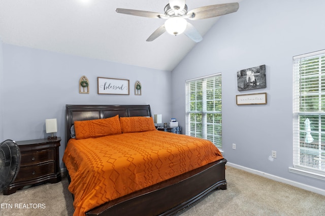 bedroom with light carpet, ceiling fan, and vaulted ceiling