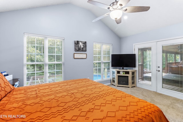 bedroom featuring ceiling fan, high vaulted ceiling, light carpet, access to outside, and french doors