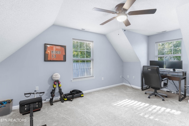 carpeted office featuring a textured ceiling, ceiling fan, and lofted ceiling