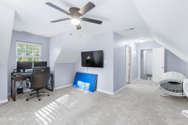 office with vaulted ceiling, carpet floors, and ceiling fan