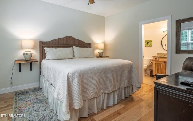 bedroom featuring ceiling fan, connected bathroom, and light hardwood / wood-style floors