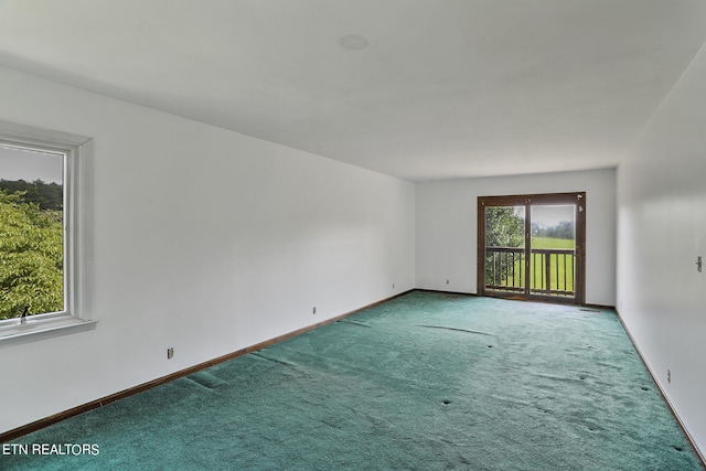 view of carpeted spare room